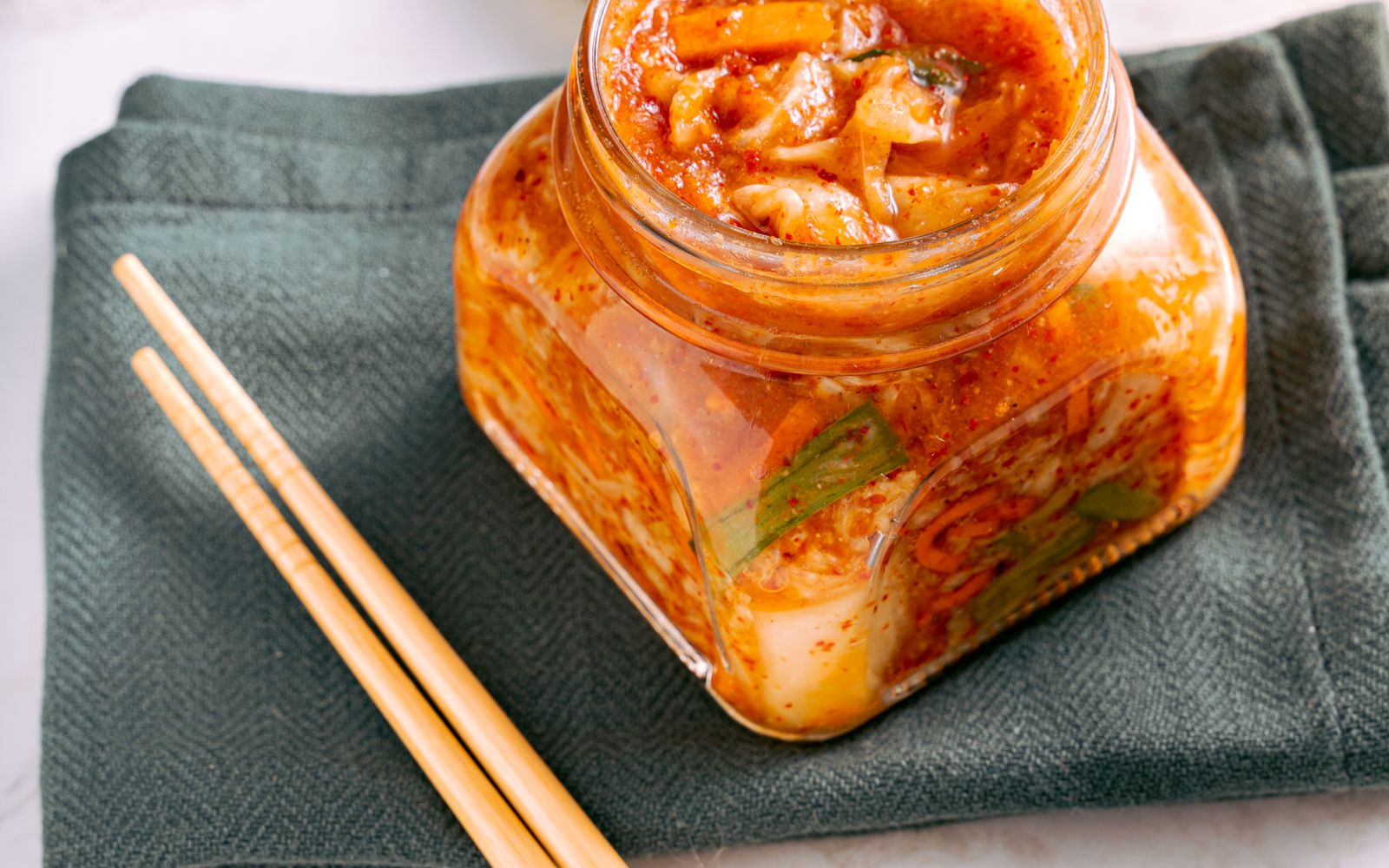 Kimchi in a clear glass jar